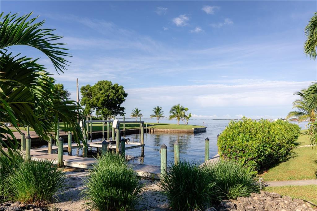 14040 Schultz Road Fort Myers, FL 33908 - Photo 3 of 48 Dock featuring boat lift and a water view