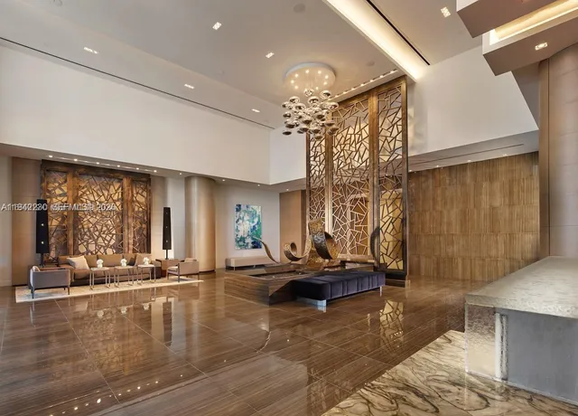 a view of a livingroom with furniture window and wooden floor