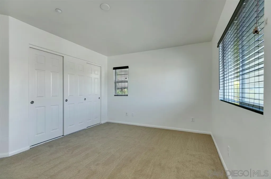 10472 Celestial Waters Drive Spring Valley, CA 91977 - Photo 13 of 24 a view of an empty room with a window