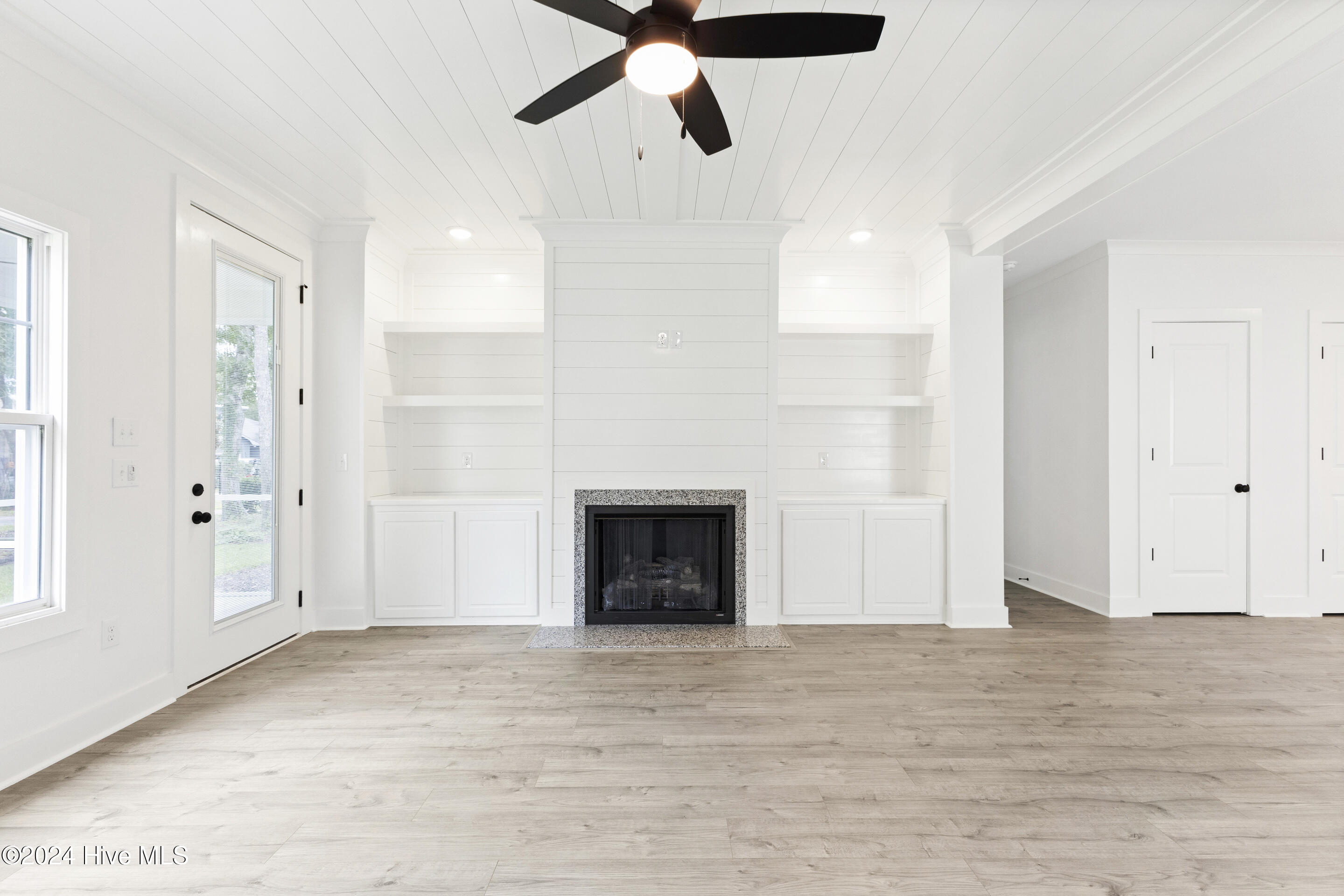 1656 Winding Way Southwest Ocean Isle Beach, NC 28469 - Photo 15 of 49 Living room with wood details, fireplace and wood beams