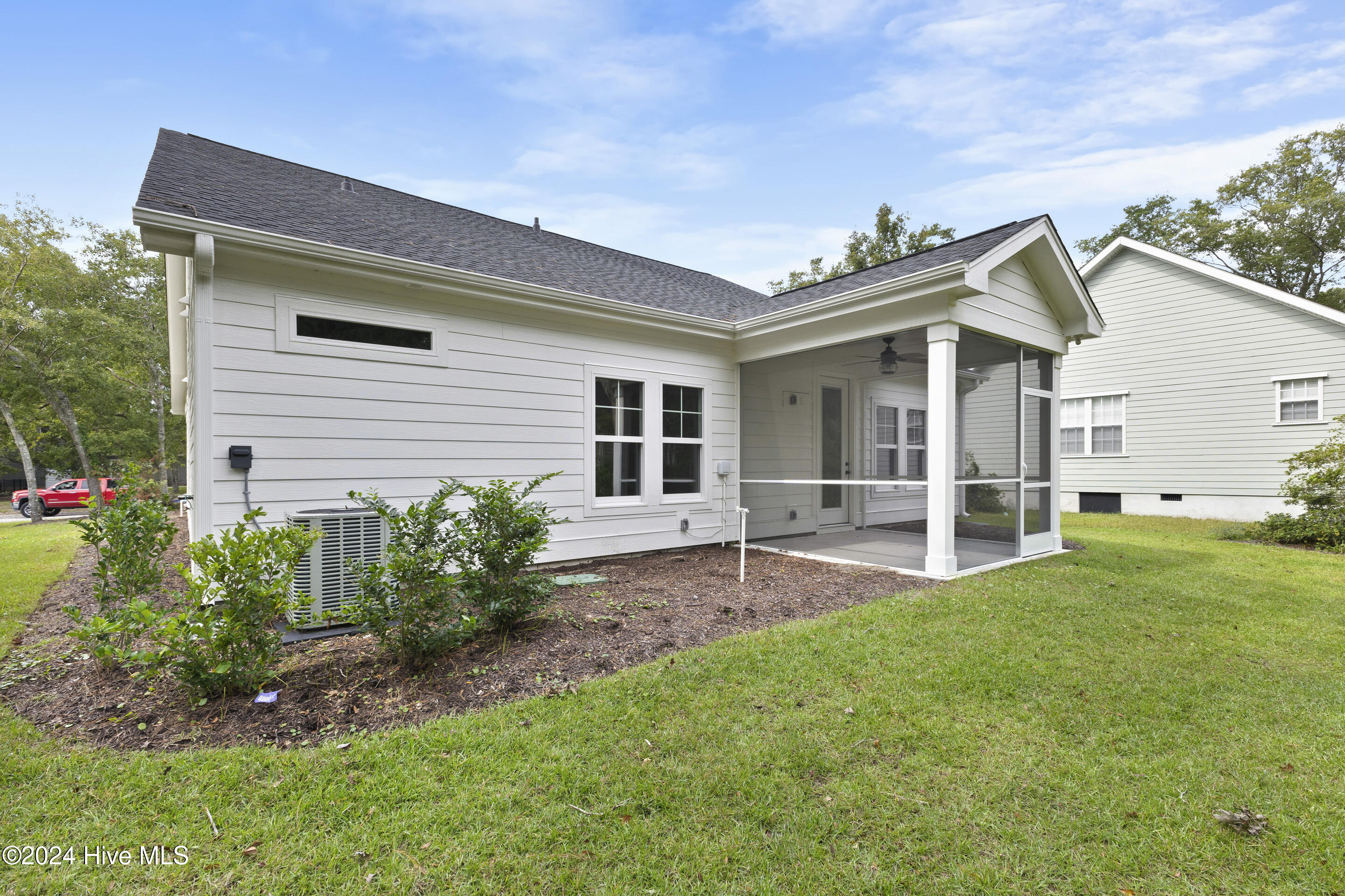 1656 Winding Way Southwest Ocean Isle Beach, NC 28469 - Photo 38 of 49 Screen porch and upgraded landscaping