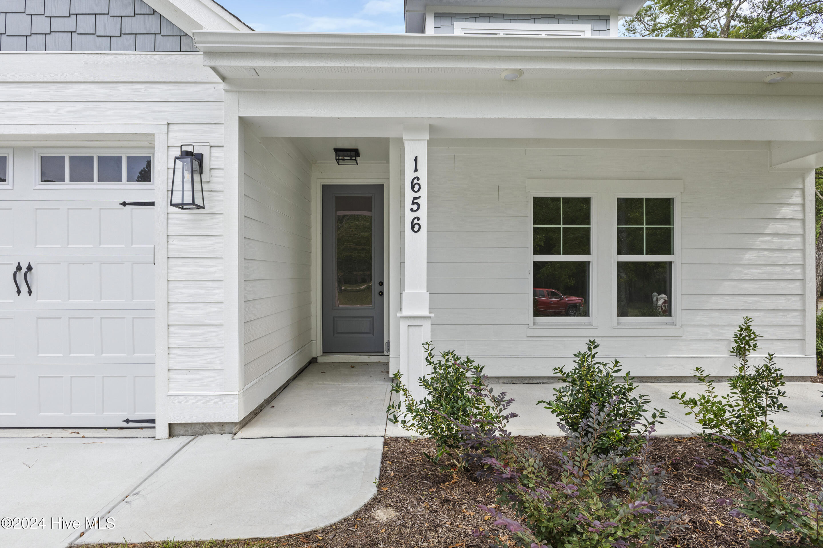 1656 Winding Way Southwest Ocean Isle Beach, NC 28469 - Photo 4 of 49 Front porch