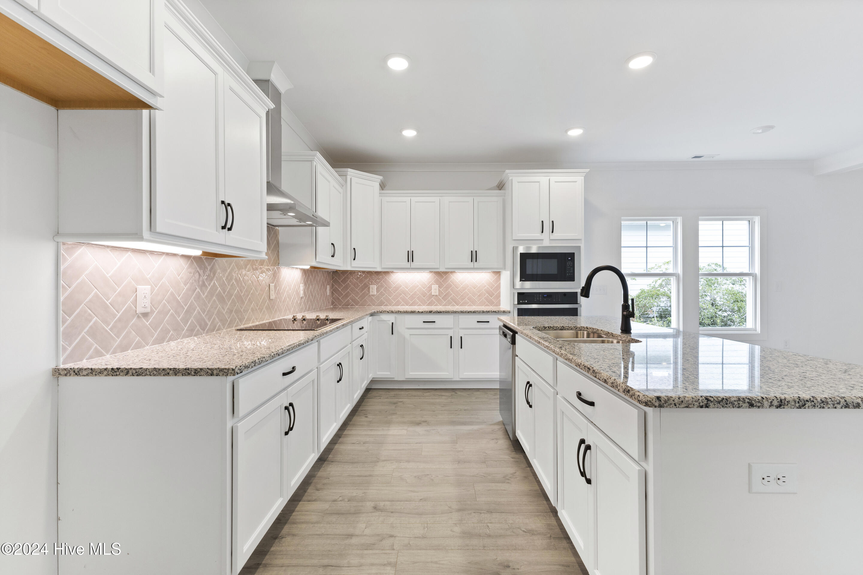 1656 Winding Way Southwest Ocean Isle Beach, NC 28469 - Photo 7 of 49 Upgraded Kitchen with large island