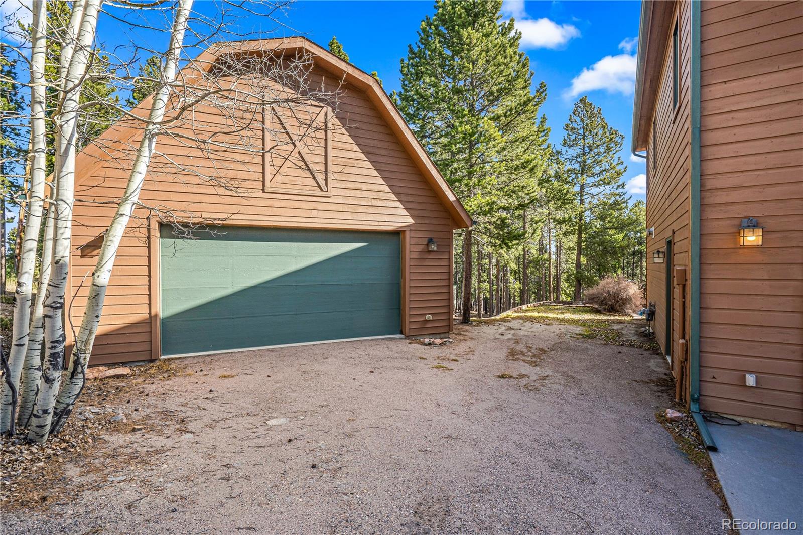 9274 Sandy Lane Conifer, CO 80433 - Photo 5 of 48 a view of a house with a outdoor space