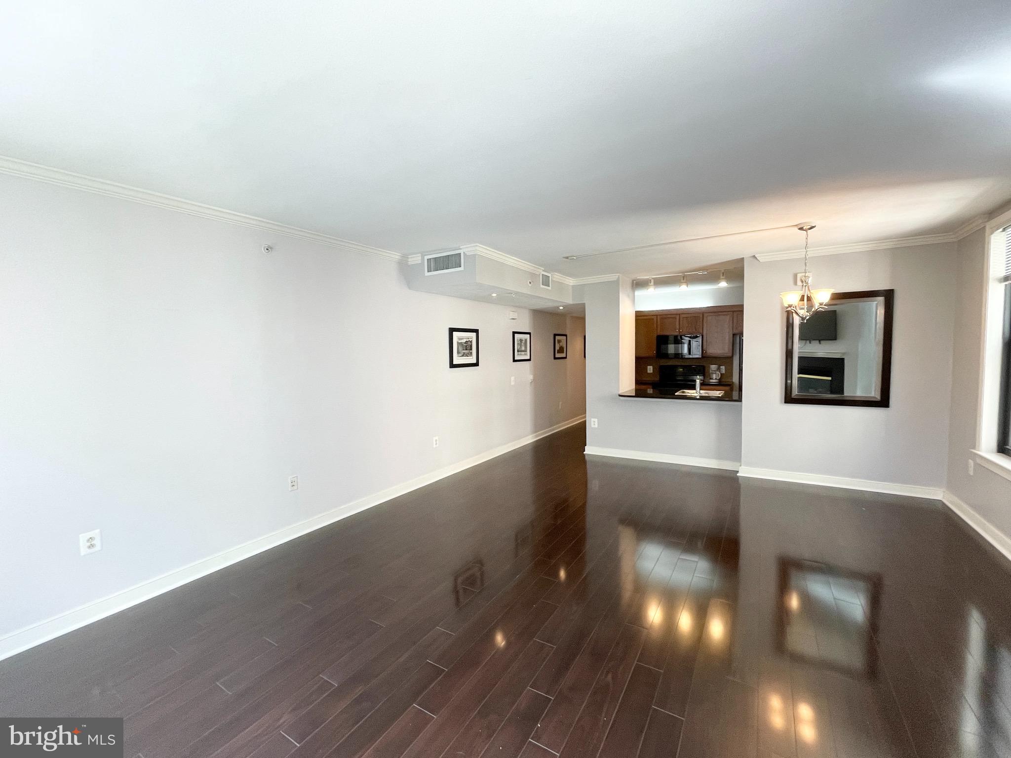 631 D Street Northwest, Unit 626 Washington, DC 20004 - Photo 2 of 19 a view of a living room with kitchen