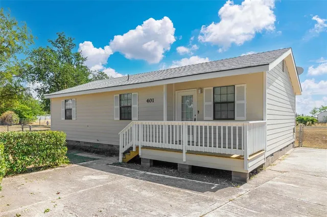 a view of a deck with a backyard