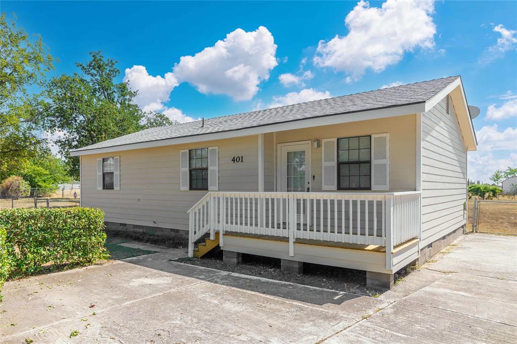 a view of a deck with a backyard