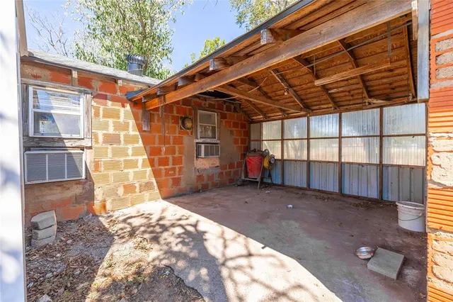 a view of a backyard of a house