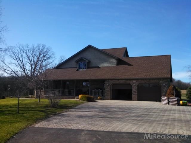 4875 Mill Creek Road Avoca, MI 48006 - Photo 19 of 30 This is a view of the side of the home.