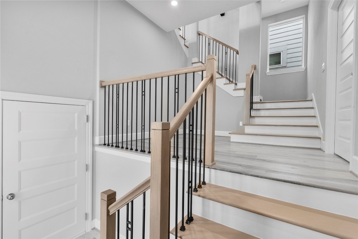 1122 West 16th Street, Unit B Houston, TX 77008 - Photo 2 of 31 a view of staircase with railing and white walls