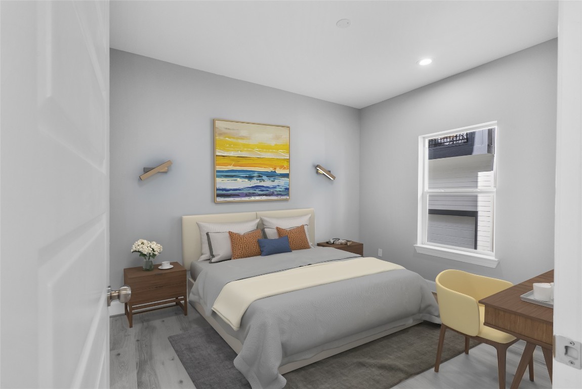 1122 West 16th Street, Unit B Houston, TX 77008 - Photo 5 of 31 a bedroom with a bed and window