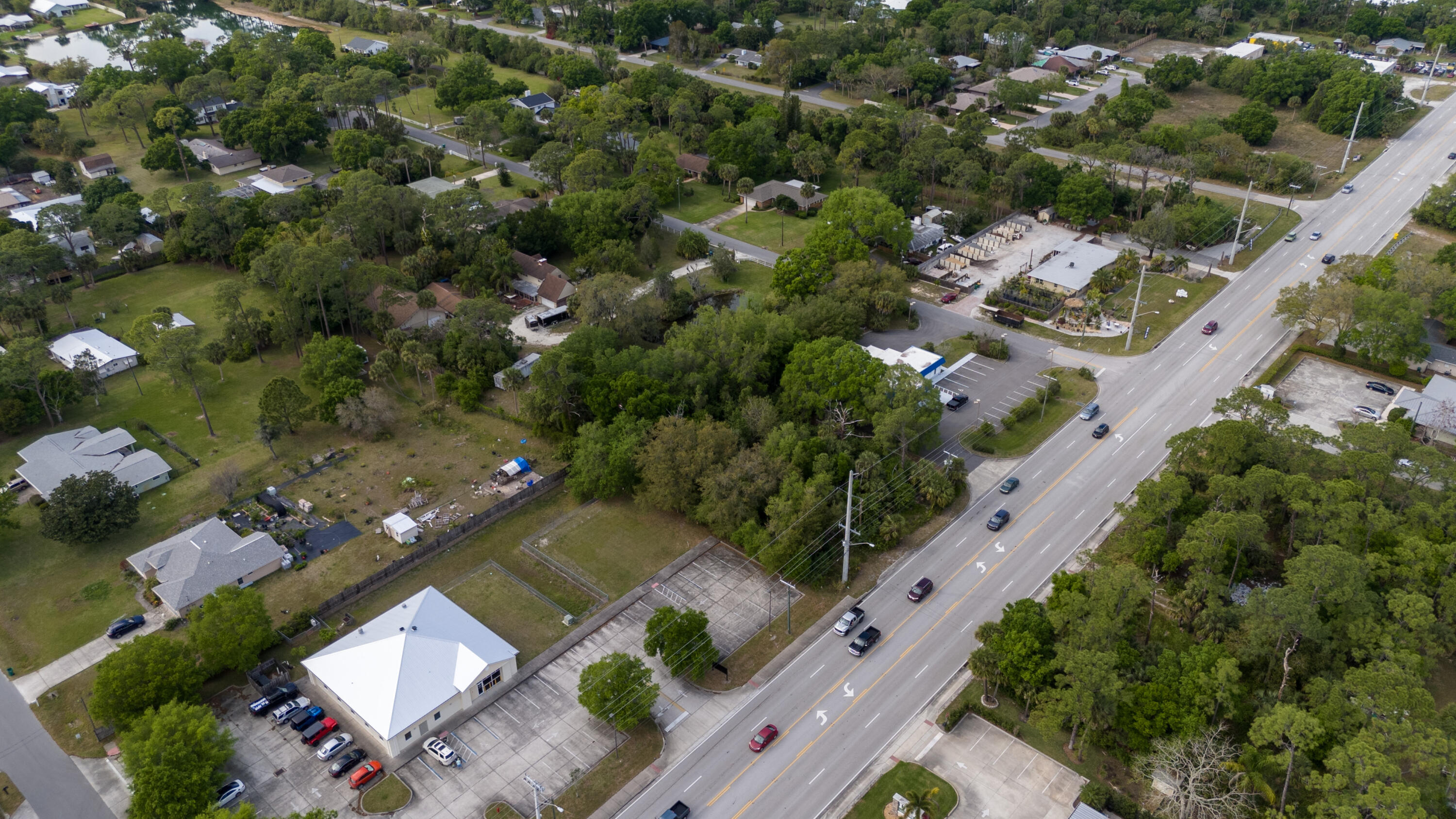 0 South Wickham Road Melbourne, FL 32904 - Photo 11 of 14 an aerial view of a residential houses with outdoor space