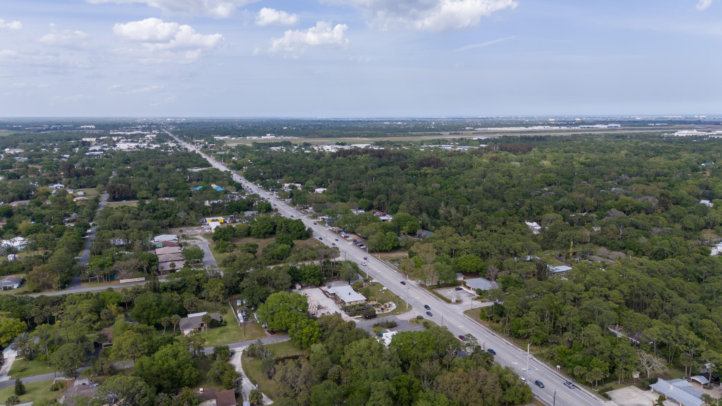 0 South Wickham Road Melbourne, FL 32904 - Photo 14 of 14 an aerial view of a city