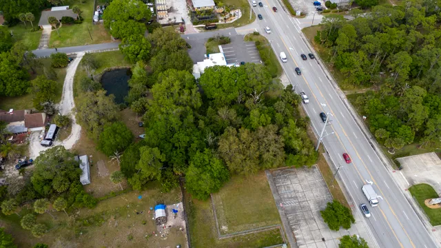 an aerial view of residential house with outdoor space