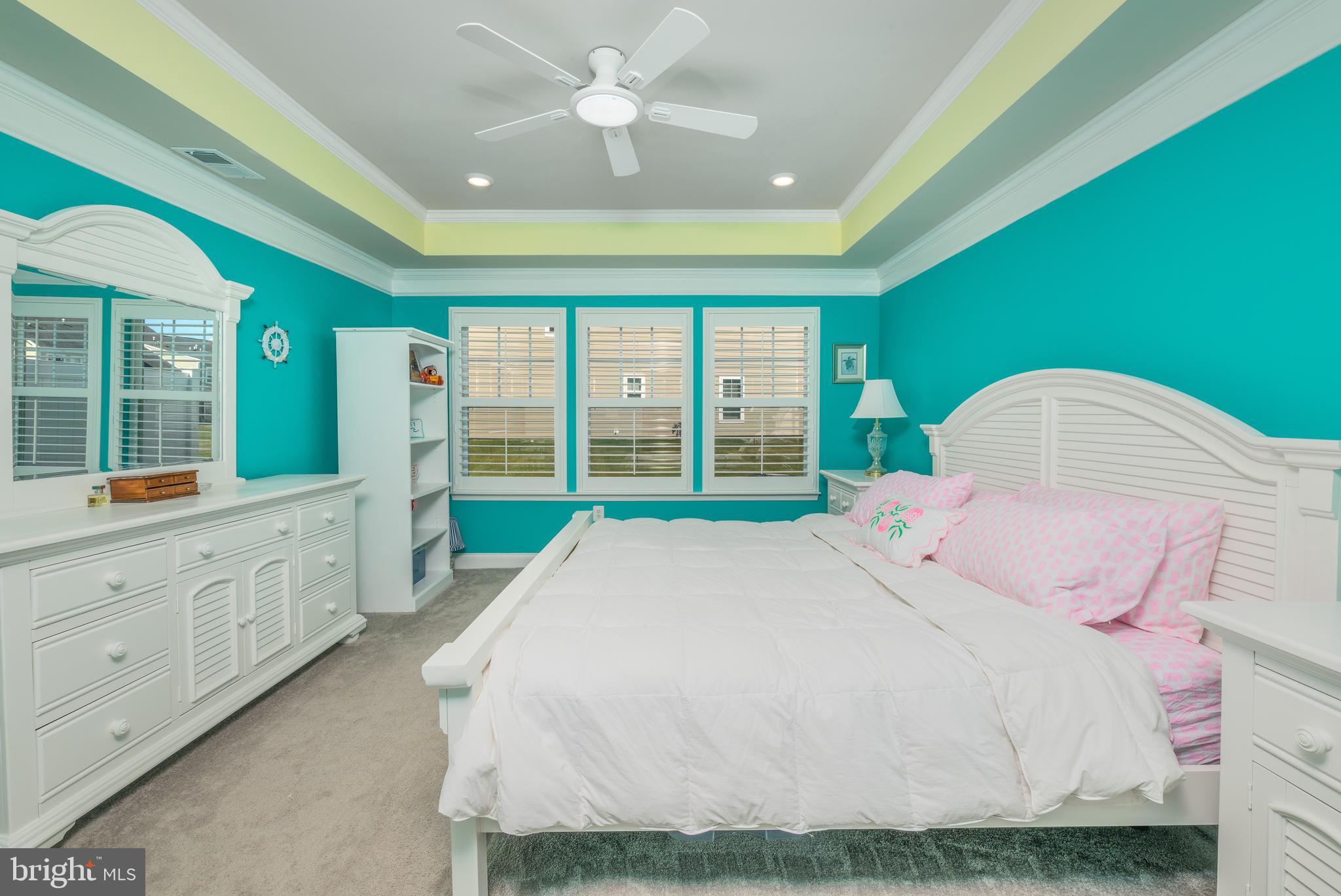 27236 18th Boulevard Millsboro, DE 19966 - Photo 14 of 43 a spacious bedroom with a bed and a large window