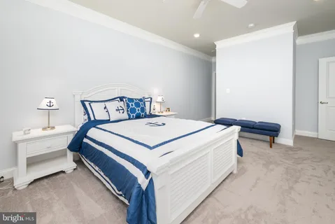 a bedroom with a bed and a table in it