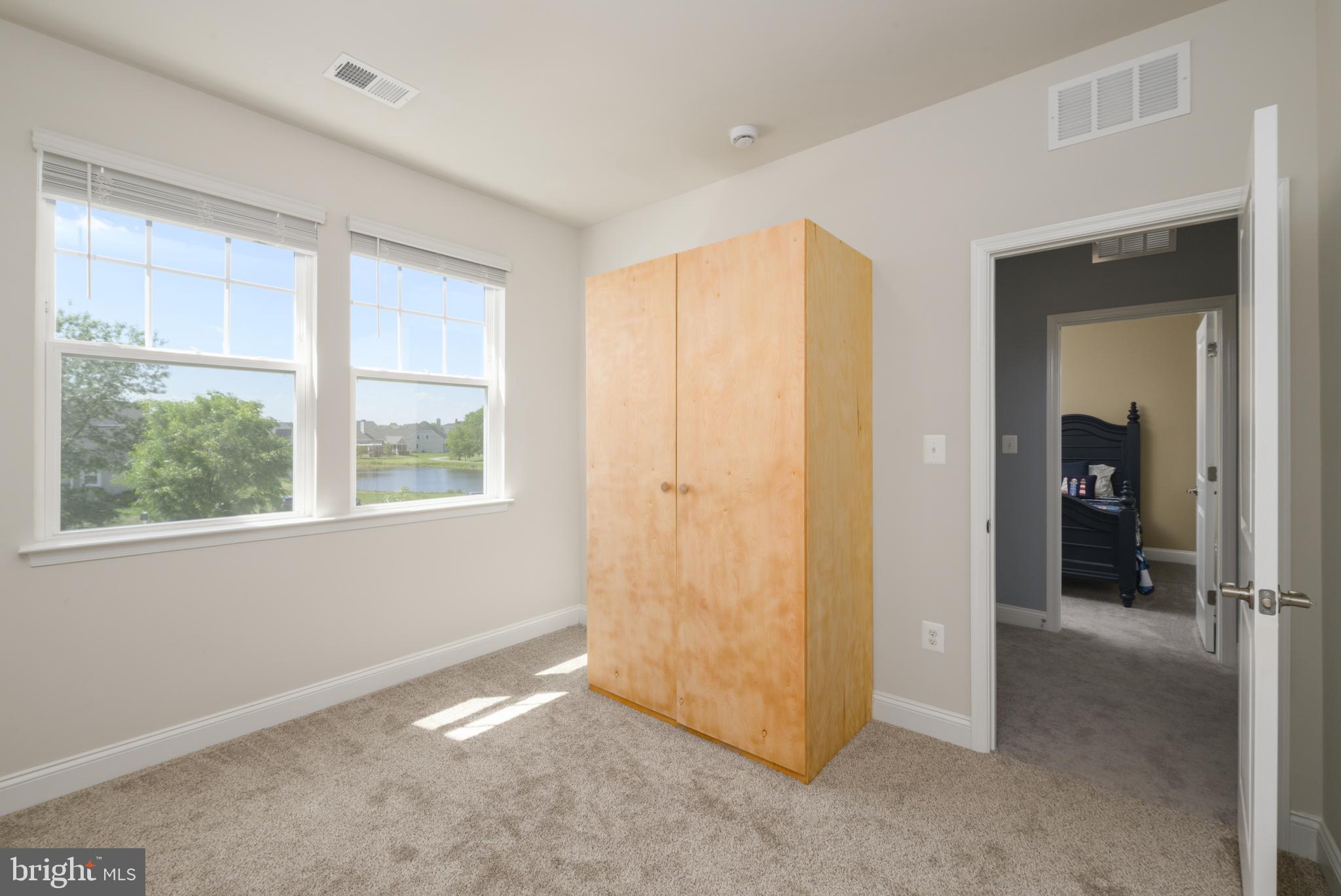 27236 18th Boulevard Millsboro, DE 19966 - Photo 28 of 43 a view of an empty room with a window