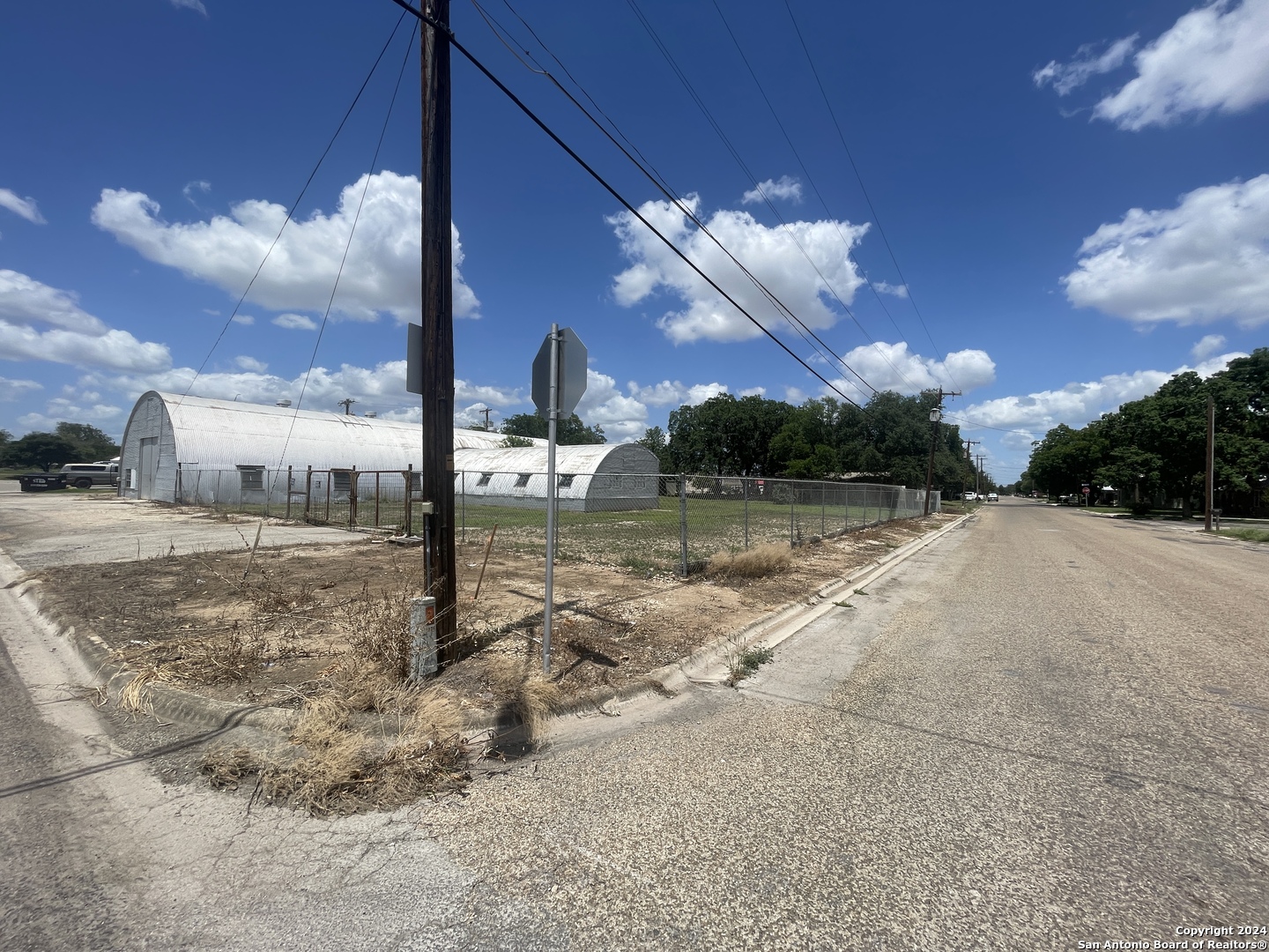 1905 Ave R Hondo, TX 78861 - Photo 6 of 8 a view of a house with a yard