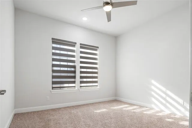 a view of a room with shelf on the wall