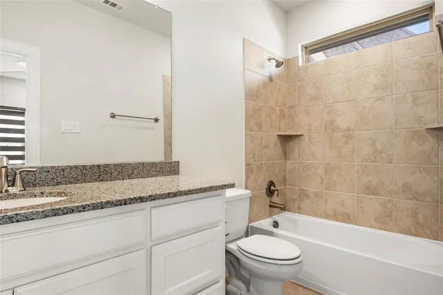 a view of a storage & utility room with two washing machine