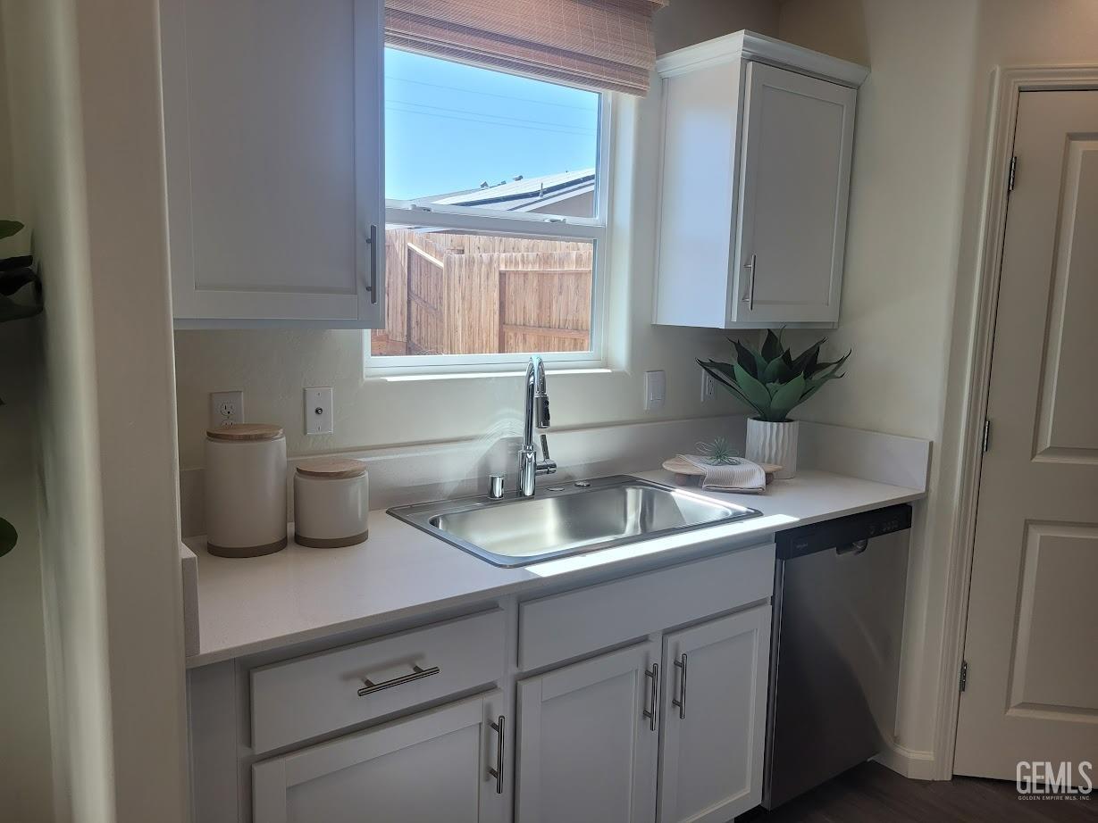 Undisclosed Address Bakersfield, CA 93307 - Photo 15 of 23 a kitchen with a sink and a window