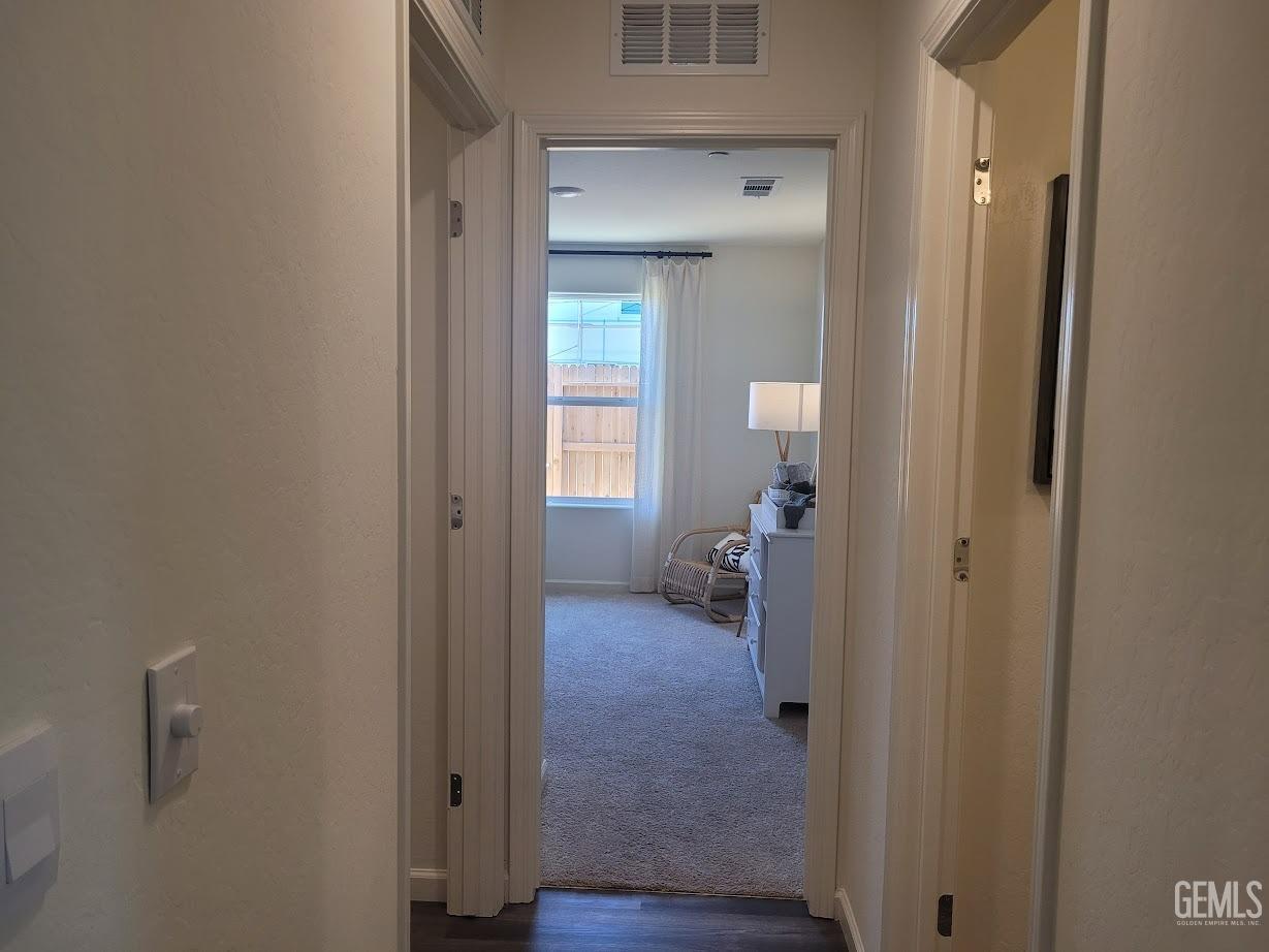 Undisclosed Address Bakersfield, CA 93307 - Photo 9 of 23 a view of a livingroom from a hallway