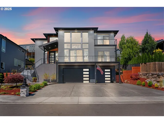 a front view of a house with parking