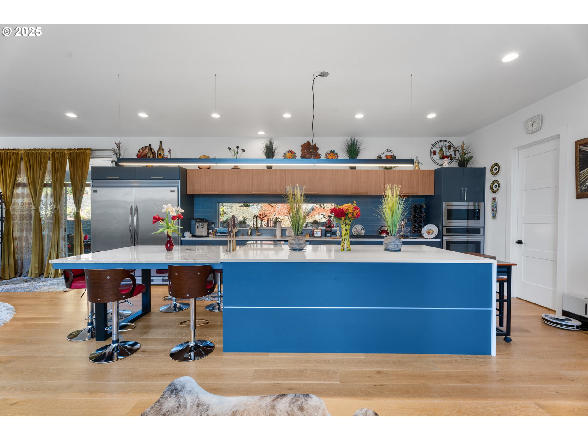 1345 North R Street Washougal, WA 98671 - Photo 11 of 46 a living room with kitchen furniture and a wooden floor