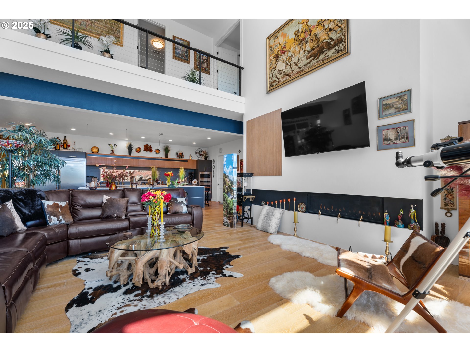 1345 North R Street Washougal, WA 98671 - Photo 12 of 46 a living room with lots of furniture and a flat screen tv