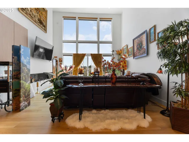 a room with furniture and a flat screen tv