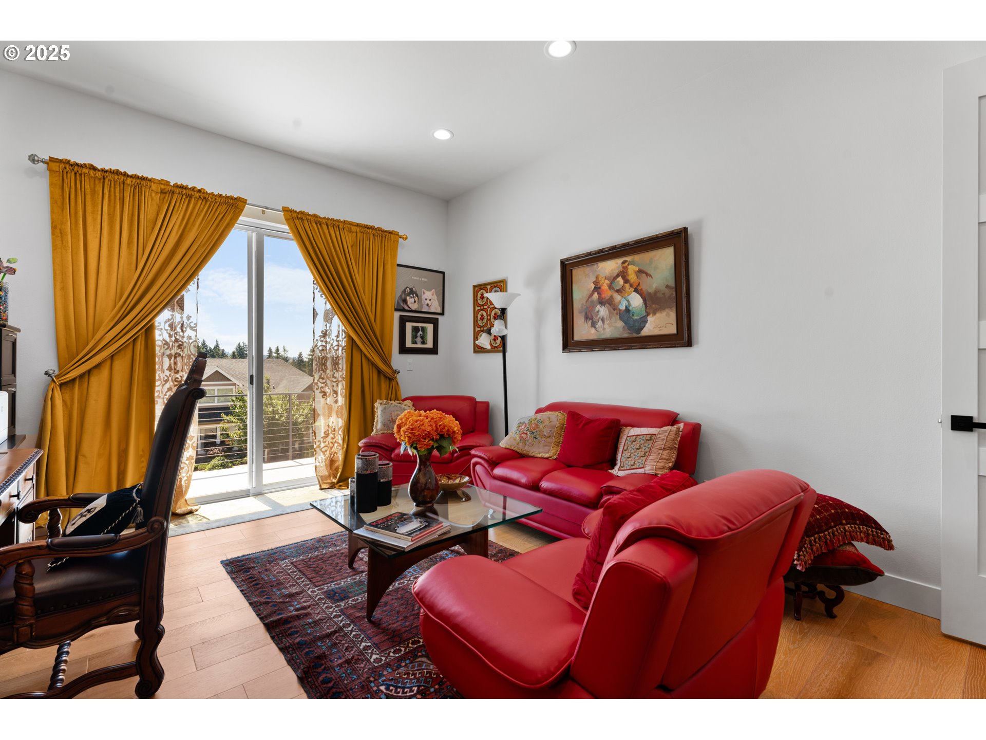 1345 North R Street Washougal, WA 98671 - Photo 18 of 46 a bed room with a bed and a painting on the wall