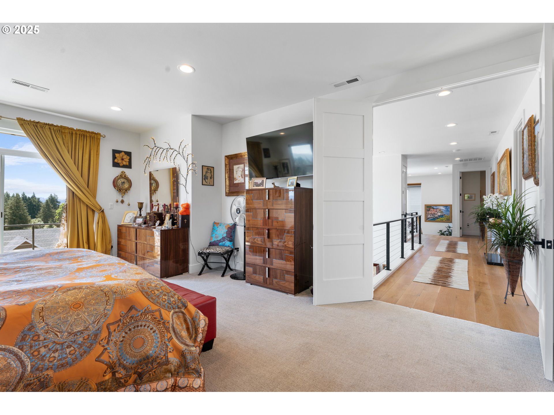 1345 North R Street Washougal, WA 98671 - Photo 34 of 46 a living room with furniture and a flat screen tv