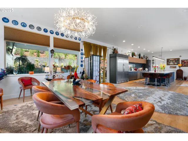 a dining room with a table and chairs