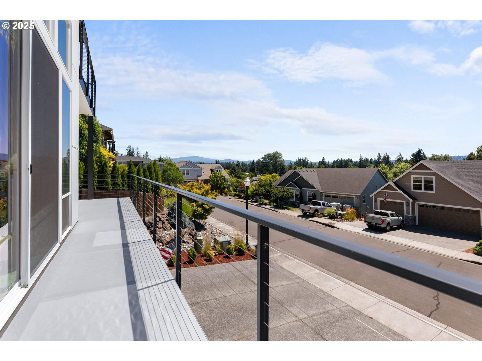 1345 North R Street Washougal, WA 98671 - Photo 42 of 46 a view of a balcony with two chairs