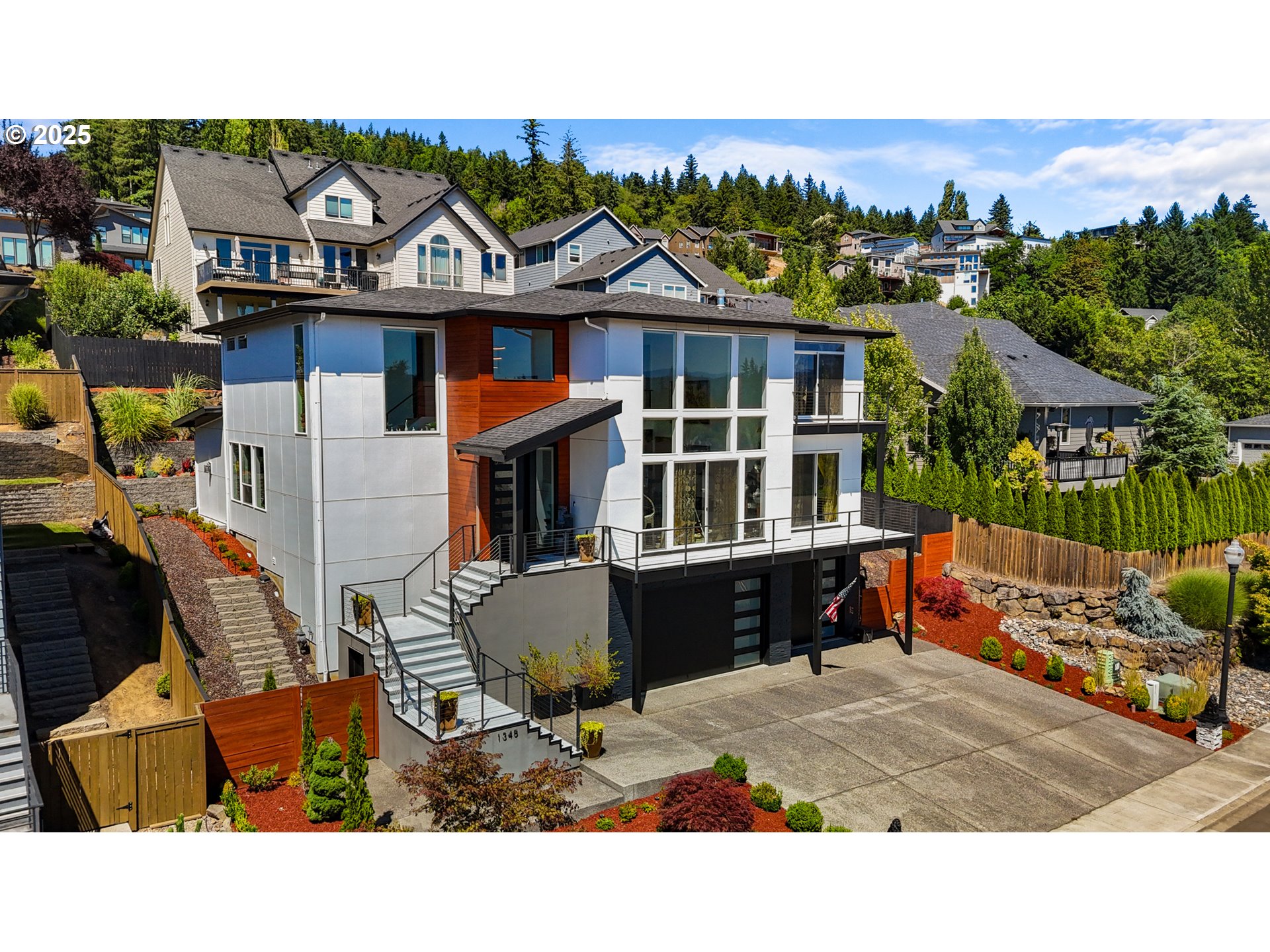 1345 North R Street Washougal, WA 98671 - Photo 46 of 46 an aerial view of a house with a yard