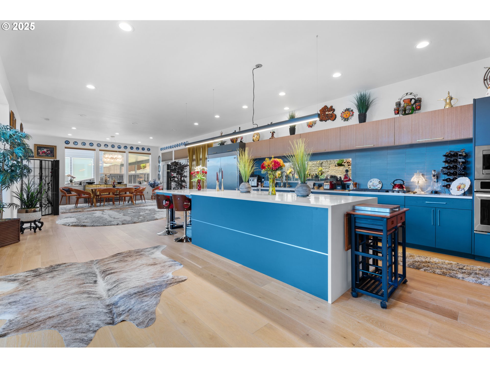 1345 North R Street Washougal, WA 98671 - Photo 6 of 46 a living room with lots of furniture and clutter