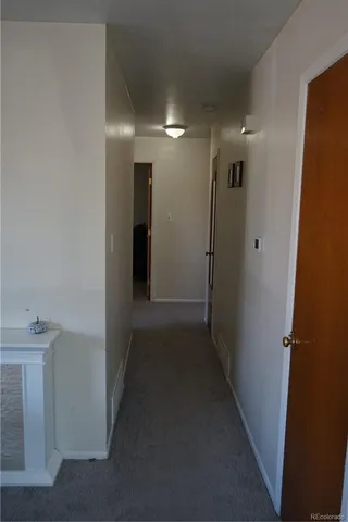 a view of hallway with shower