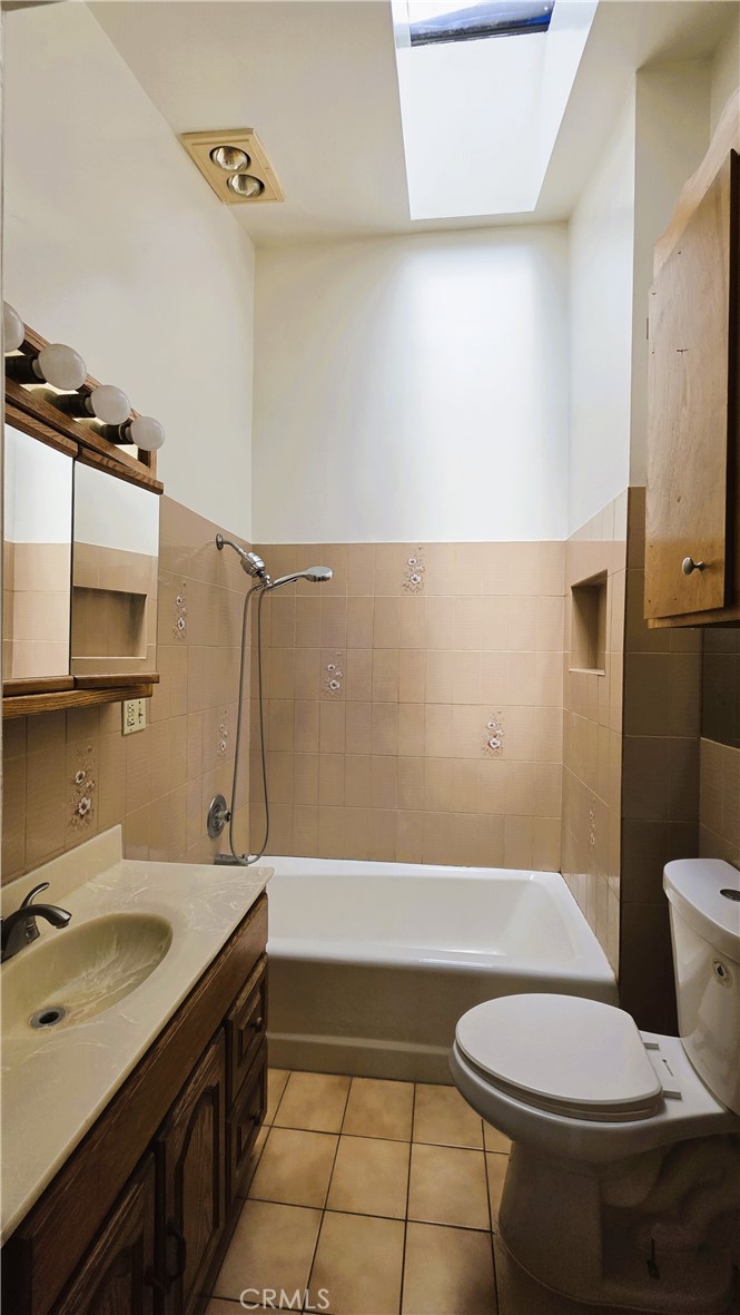 488 Royce Street Altadena, CA 91001 - Photo 6 of 10 a bathroom with a sink a toilet and shower