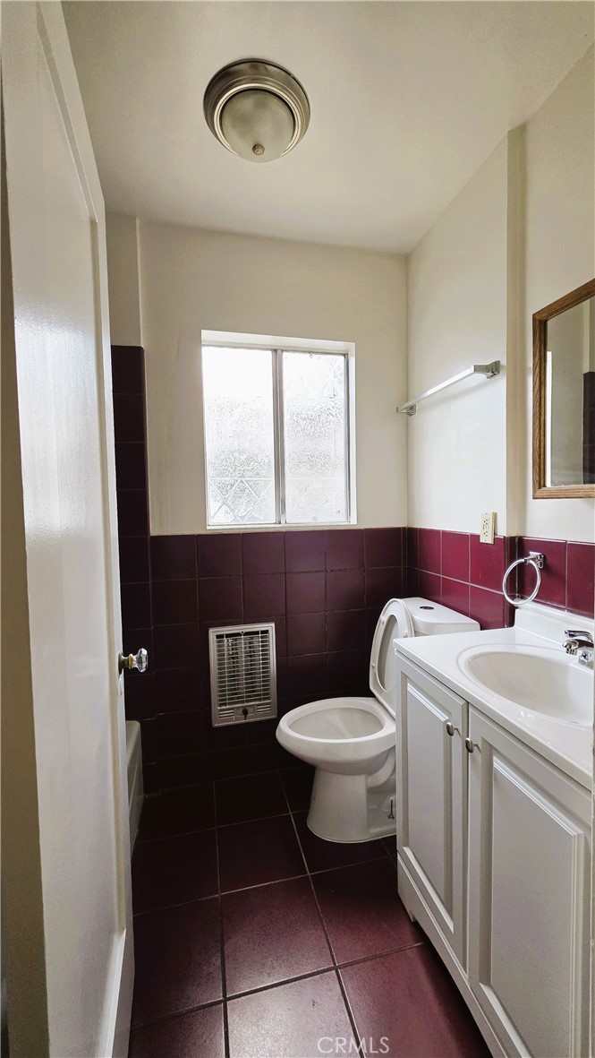 488 Royce Street Altadena, CA 91001 - Photo 8 of 10 a bathroom with a toilet sink and mirror