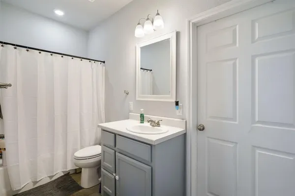 a view of a garage with the kitchen