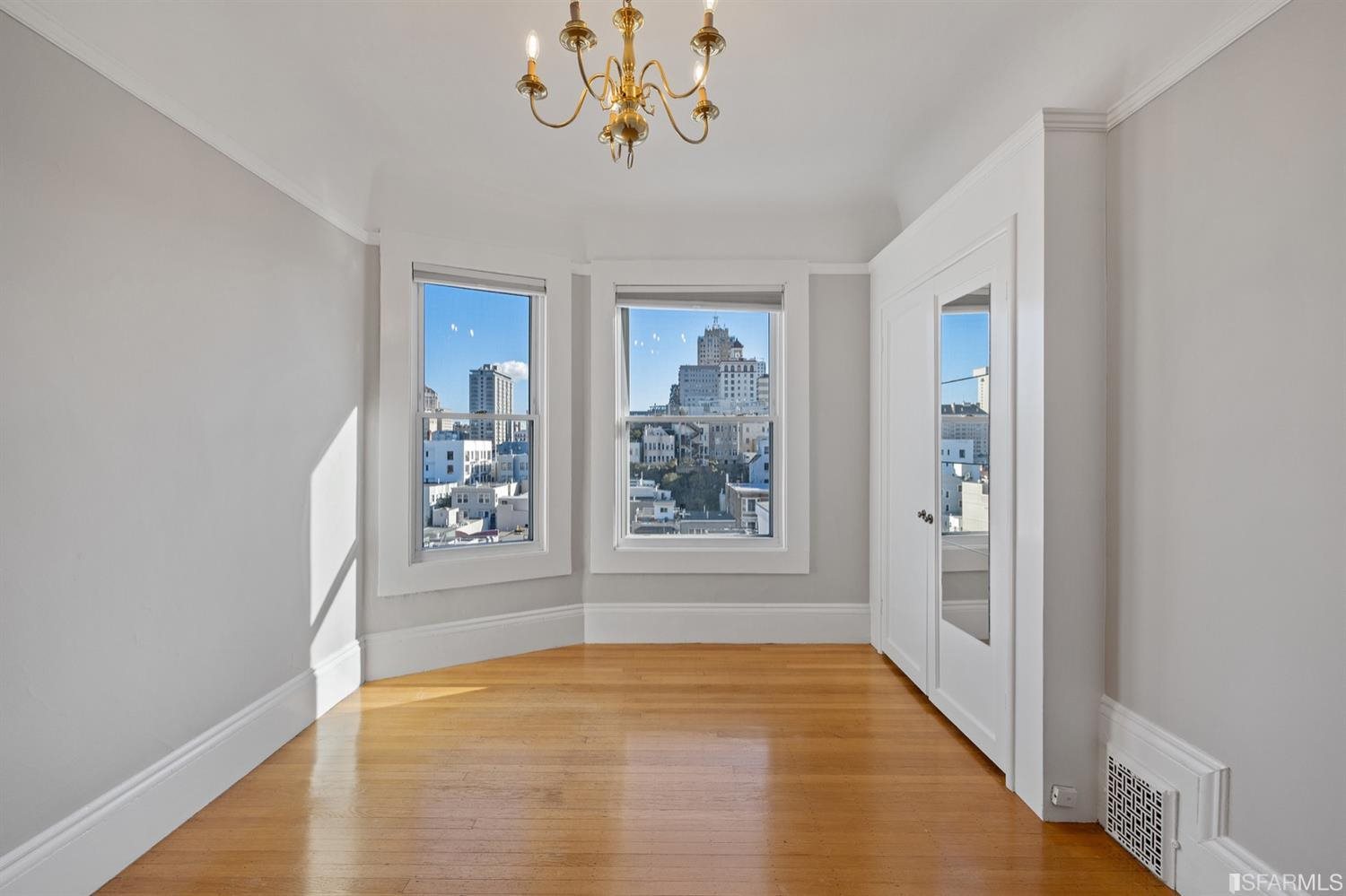 1069 Broadway San Francisco, CA 94133 - Photo 34 of 43 wooden floor in an empty room with a window