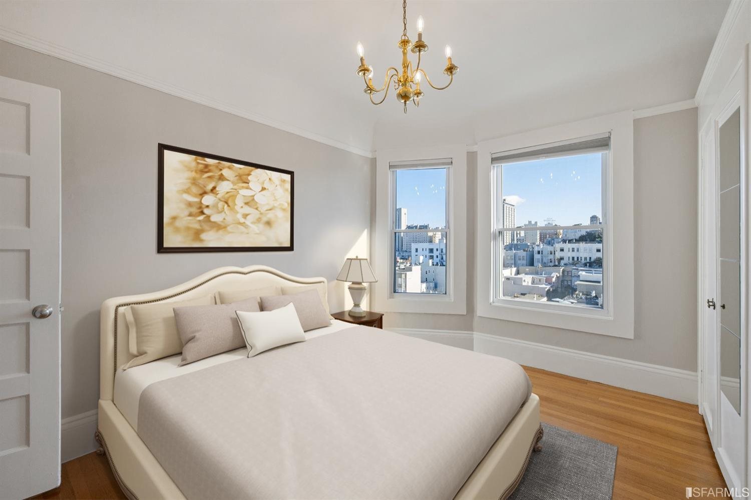 1069 Broadway San Francisco, CA 94133 - Photo 5 of 43 a bedroom with bed and window with lamp