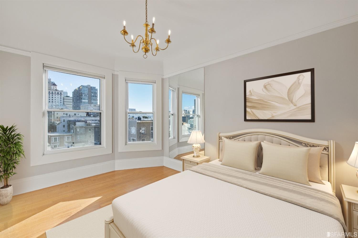 1069 Broadway San Francisco, CA 94133 - Photo 7 of 43 a bedroom with a large bed and a painting on the wall