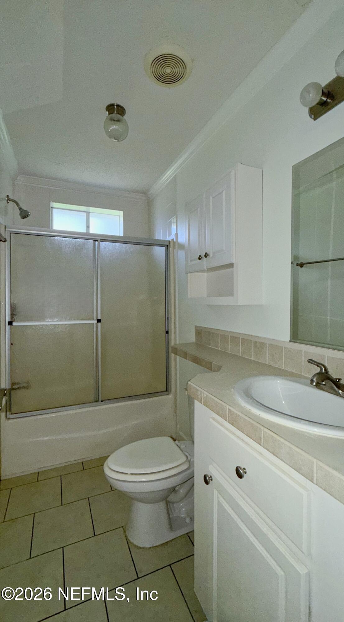 136 Short Pine Road Hawthorne, FL 32640 - Photo 24 of 39 a bathroom with a toilet a sink and shower