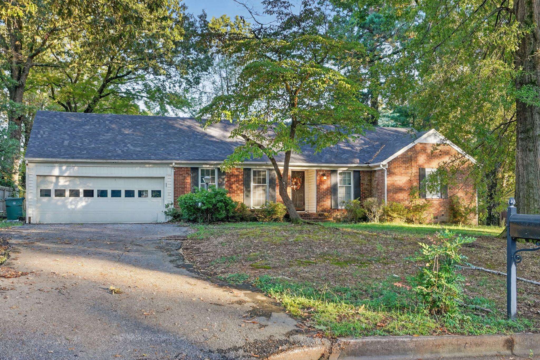 3034 Bannockburn Road Memphis, TN 38128 - Photo 2 of 18 a view of a house with a yard