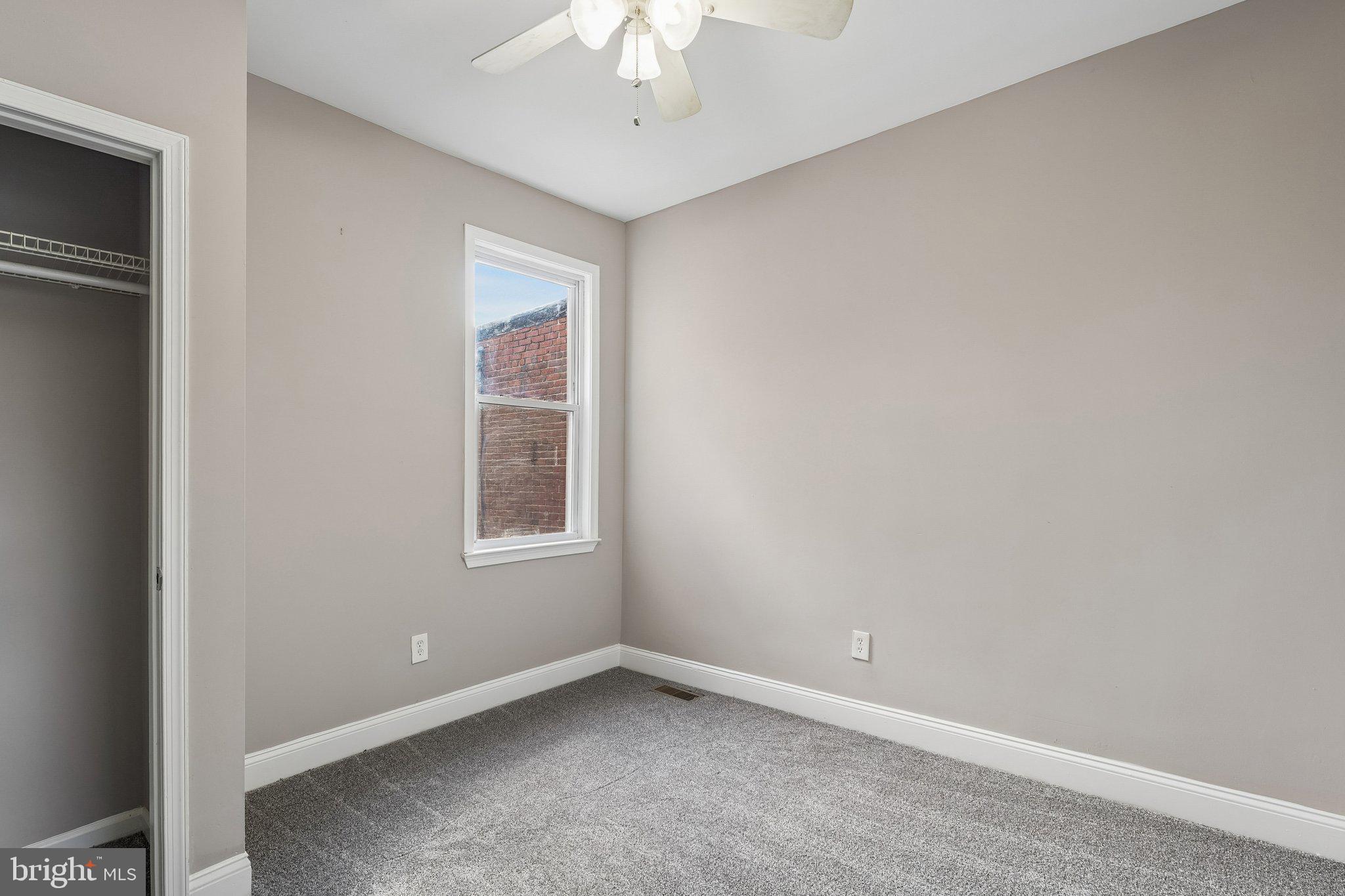 2817 Pelham Avenue Baltimore, MD 21213 - Photo 15 of 25 an empty room with a window