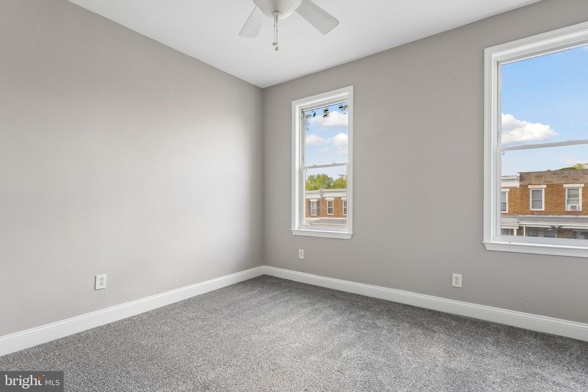 2817 Pelham Avenue Baltimore, MD 21213 - Photo 17 of 25 an empty room with a window