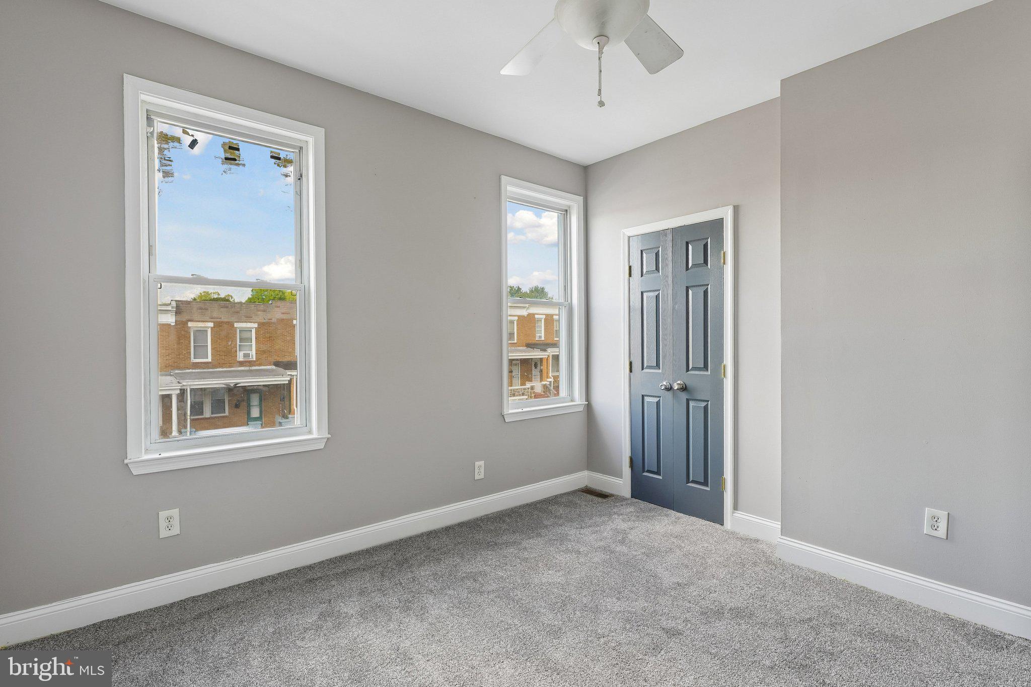 2817 Pelham Avenue Baltimore, MD 21213 - Photo 18 of 25 a view of an empty room with a window