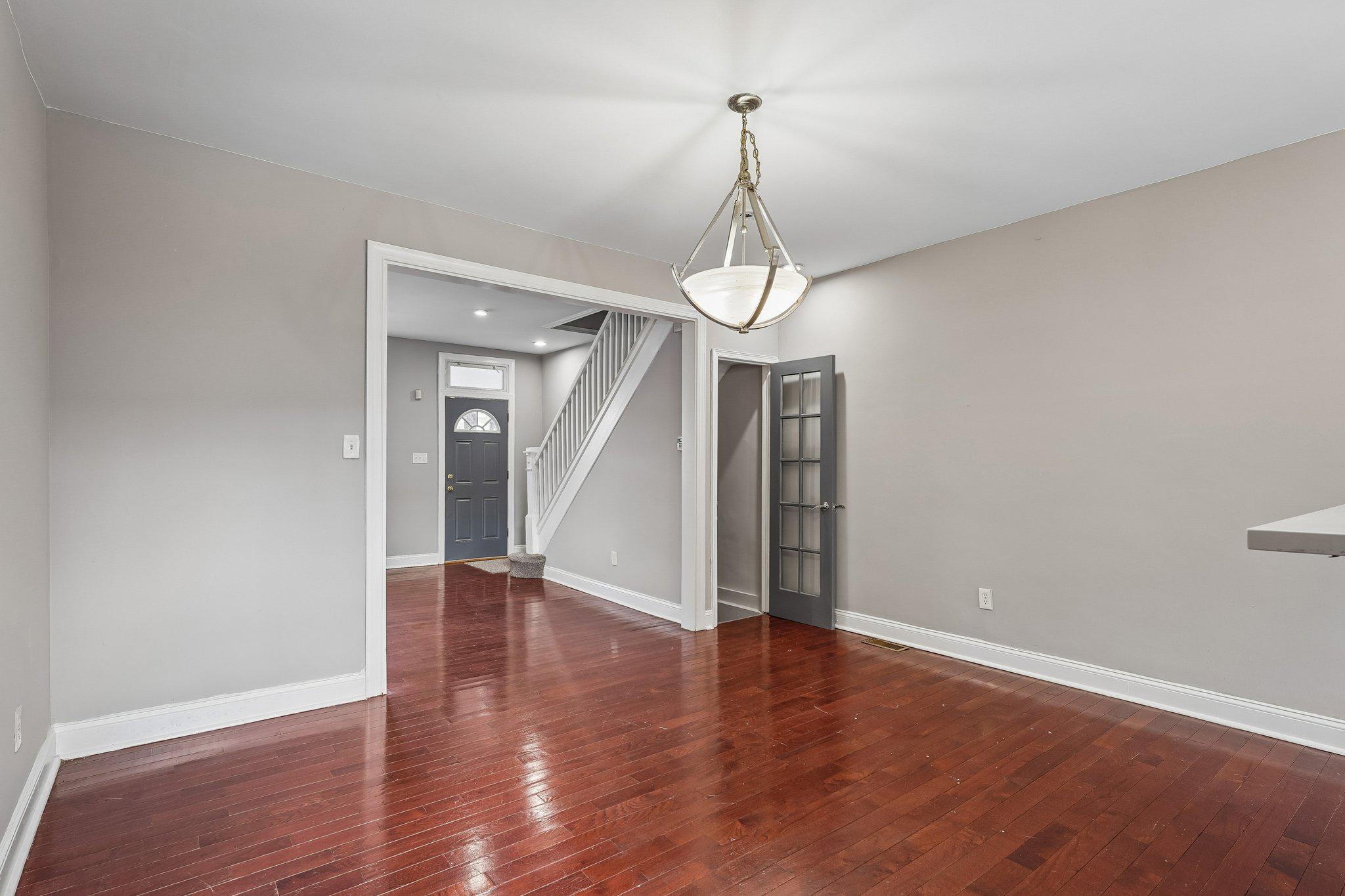 2817 Pelham Avenue Baltimore, MD 21213 - Photo 6 of 25 a view of empty room with wooden floor
