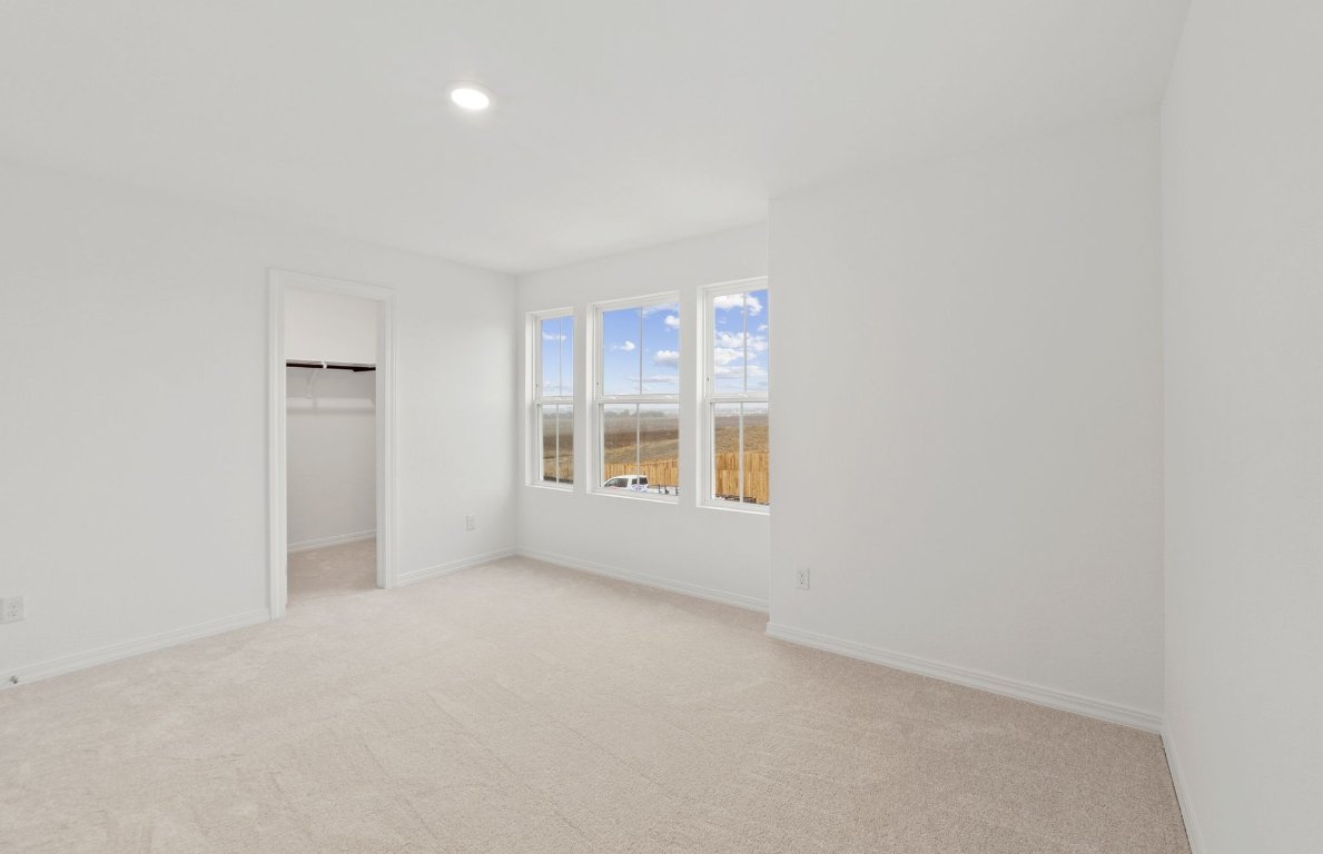 333 Sullivan Way Elgin, TX 78621 - Photo 14 of 18 an empty room with a window